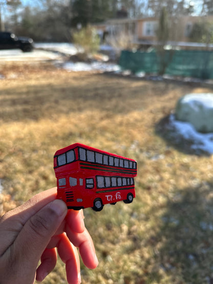 Double-Decker Bus Fridge Magnets – A Symbol of Resilience and Culture
